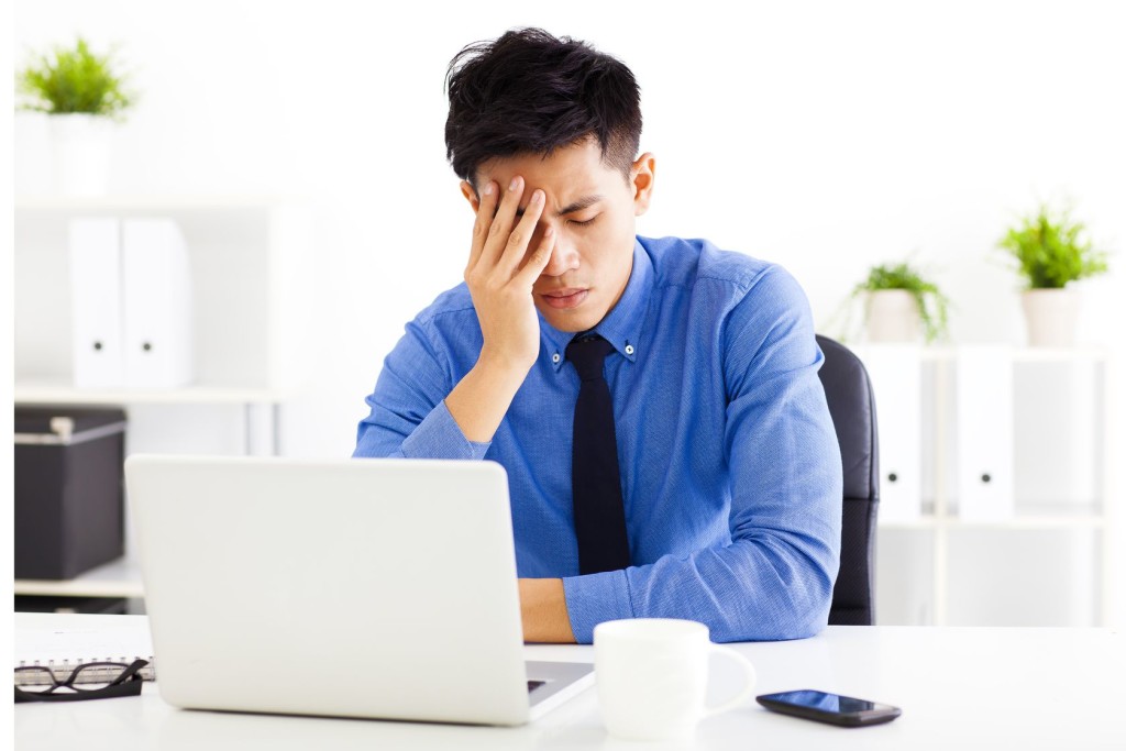 Stressed business man in the office